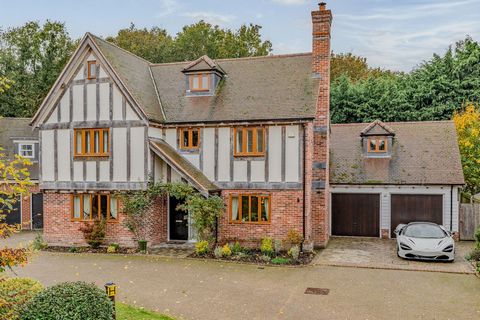 Step inside this impressive Tudor-inspired family residence in Edney Common, Chelmsford. As you enter the home through a grand entrance hall that sets the tone for its refined interiors, with oak flooring, a wood-burning stove, and an oak-glazed stai...