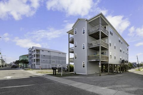 Embark on the ultimate coastal lifestyle journey within this prestigious Carolina Beach condominium. Set your car aside and immerse yourself in the vibrant downtown scene, boasting an award-winning boardwalk, quaint coffee shops, delectable restauran...