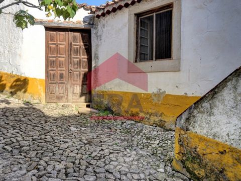 Haus zum Erholen innerhalb der Mauern der mittelalterlichen Burg von Óbidos. Enormes Potenzial für Rentabilität als lokale Unterkunftseinheit. Außenbereich mit Garten mit Blick auf das Innere der Burg von Óbidos und ihre Umgebung. In der Nähe von Ein...