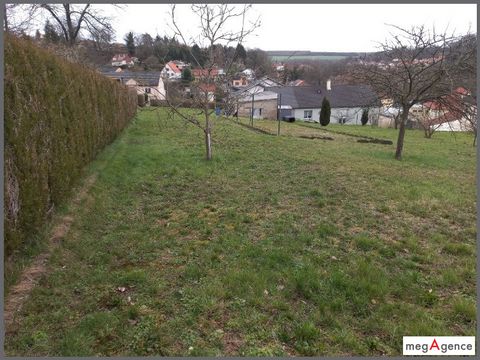 À SAISIR – Terrain de 1050 m² avec garage déjà implanté !