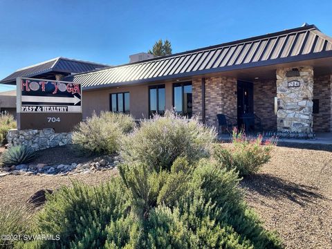 Opportunity to buy TWO commercial buildings on the main corridor in Cottonwood. The main building was completely renovated by the previous owners, and city permit records show the cost of that renovation was aprox. $500,000. Bullet proof windows thro...