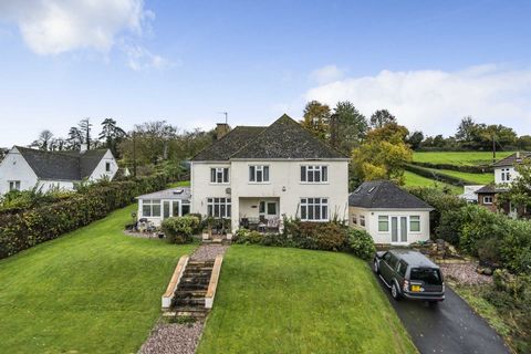 A generous four bedroom detached 1930`s home set within roughly half an acre of established grounds with south facing, picturesque countryside views. Detached Home Office/Gym/Sauna. The driveway provides ample off road parking and access to the doubl...