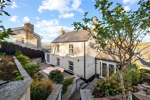 Elm Cottage has a rich history dating from 17C. It was originally, part of a working farm with a Tythe barn and a cottage, now joined together to form an elegant period and contemporary detached family home. It has the added bonus of a south-facing g...