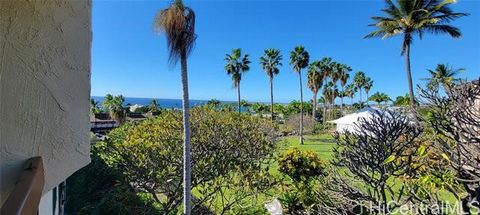 Ocean views from this light filled totally renovated condo in the heart of Kailua-Kona. Walk to everything....the beach...restaurants...shopping...historic trails and palaces. This is Hawaii!! All new cabinetry expands the kitchen realm. Topped by Qu...