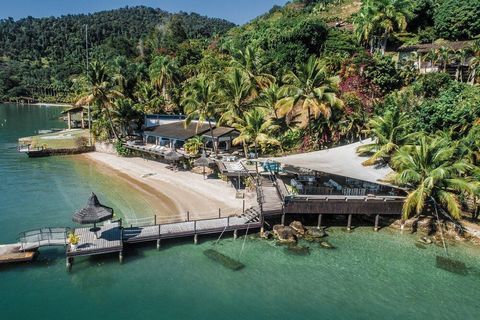 Paraty, Brazil is home to a one-of-a-kind private island resort, perfect for sea lovers looking for a secluded and breathtaking natural environment. Just a 5-minute boat ride from the historic center of Paraty, this 13,200 m2 parcel of land features ...