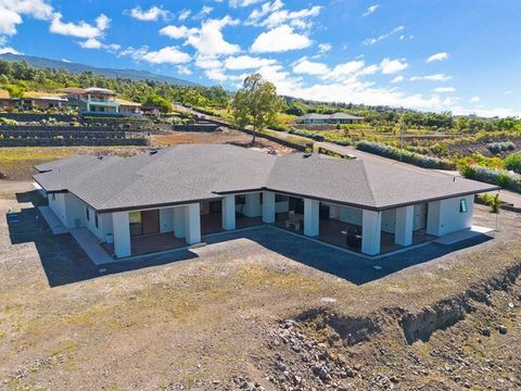 Welcome home to the captivating paradise of Ooma Plantation where you'll be enveloped with the essence of island living and luxury modern design. Nestled in an ideal elevation, this property offers a climate that's pleasantly temperate year round wit...