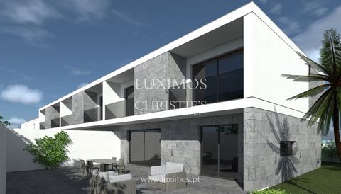 Plot of  land , with an approved PIP, for the construction of a building for multi-family housing, with two townhouses , totaling a gross construction area of 742 m2. Each villa will have three floors : basement with garage, laundry and storage, firs...