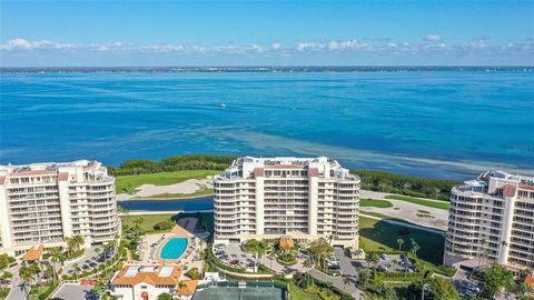 Captivating sunrises on the Bay and the sun actually setting on the Gulf of Mexico awaits from this 3BR/3BA, 8th-floor Grand Bay residence. Immerse yourself in luxury as you traverse across the new 2' x 4' light porcelain tile floors that grace the m...