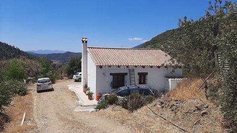 Spectacular Finca Rústica for sale located in Carratraca, in a quiet and natural environment, with house of 70 m2, store room of 21 m2 and land of 7.726 m2. The house is distributed in a large living-dining room with fireplace and equipped kitchen, t...