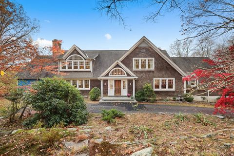 Sunlit 3 story shingle style colonial on 4 lovely private acres in back country with pool. Oversized primary suite on the first floor with sitting room, walk in closets and extra large office/ exercise room with vaulted ceiling. 4 large double bedroo...