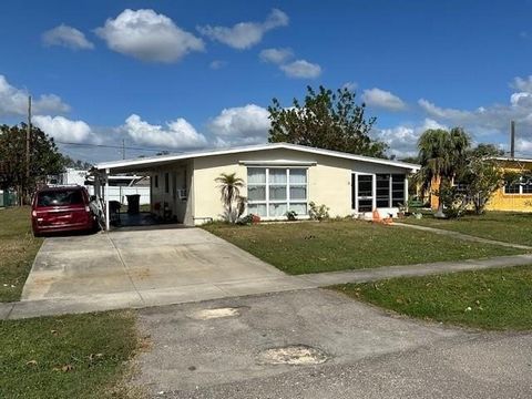 Welcome to this charming two-bedroom, one-bath home nestled in an established Port Charlotte neighborhood. This home offers peace of mind with new plumbing, a durable metal roof, and newer windows equipped with hurricane shutters. Enjoy year-round co...