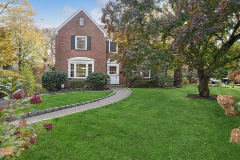 This stunning four-bedroom center hall brick colonial combines classic elegance with modern updates. Step inside to a spacious, light-filled eat-in kitchen, enjoy a large island that invites culinary creativity and family gatherings. The open layout ...