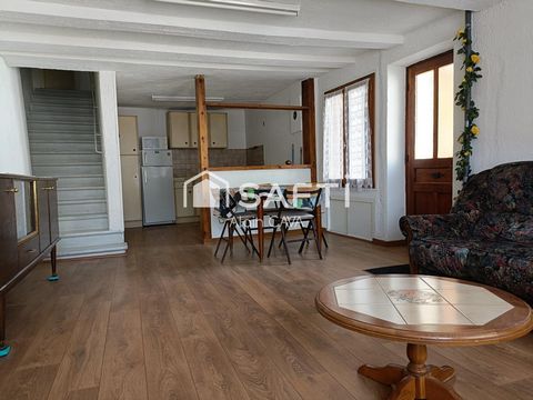 Appartement de 62m²sur 2 niveaux avec jardinet et caves