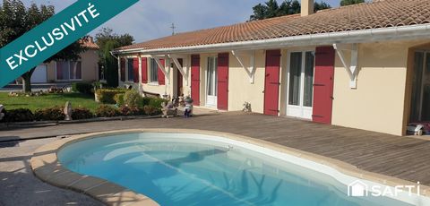 Maison familiale de plain-pied avec piscine et double garage, sur terrain arboré de plus de 1900 m2 à Couquèques (33340)