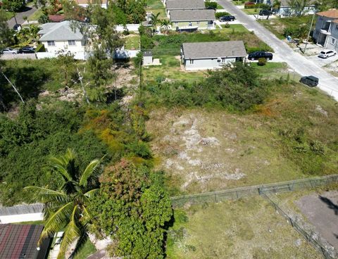 Lot 15 is a 11,256 square foot lot is located in the gated community of John Claridge Sub-division off the main Yamacraw Road (in the East), just up from Treasure Cove subdivision. All utilities are in and the lot is zoned for single family. This goo...