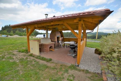 This spacious country house in the Czech Republic features a lovely pool and wooded surroundings. You can bring as many as 3 pets, so you don't need to arrange a babysitter. There are 2 bedrooms that can sleep 5 people in total. This option is ideal ...
