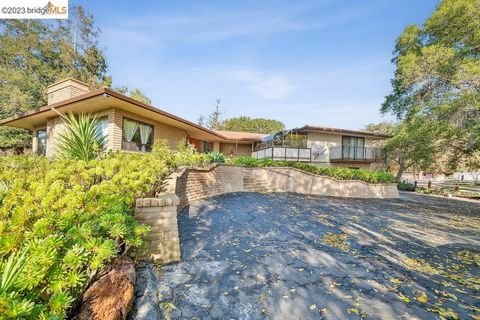 An excellent opportunity to own a custom Mid-Century ranch estate that sits on an 8-acre lot within minutes of Silicon Valley! This property is very unique and offers a big barn with concrete flooring, plenty room to run and ride, and a storage area ...