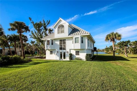 Relax and enjoy the sunsets and wildlife overlooking Palm Lake from your screened porch. A very short walk to the beach on Palm Lake's deeded beach access. This 3 bedroom 2 bath home held up beautifully during the storm. Open floor plan with fireplac...