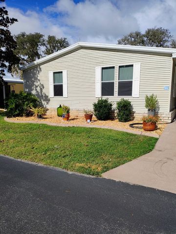 This premium 2002 Palm Harbor has been updated throughout, features include a large master double room suite. The master bath renovation features twin raised bowl sinks, a walk in tile shower, new tile flooring, linen closet and upgraded toilets. A l...