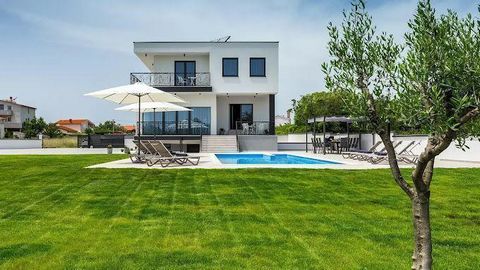 Luxury modern design villa with swimming pool in Štinjan area, located next to Valbandon and Fazana exclusive destinations, cca. 1 km from fantastic pebble beach.  In recent years, Štinjan has become very popular due to its central position on the Br...