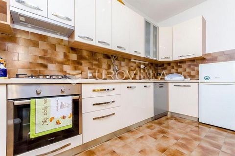 Trogir, functional three-room apartment located on the ground floor of a family house. It consists of a hallway, three bedrooms, a bathroom, a fully equipped kitchen with a dining room, and a living room with access to a spacious terrace. In the yard...