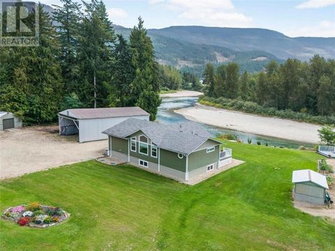 This 2017 constructed residence, along with various additional structures, is situated on striking riverfront land within Sicamous, British Columbia's city boundaries. It boasts a highly secluded environment, providing views of the river and mountain...