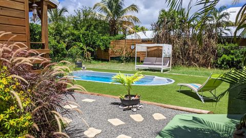 À vendre : Ensemble immobilier de 210 m2 avec vue mer à Saint-François, Guadeloupe Situé à proximité du bourg de Saint-François, station balnéaire prisée de la Guadeloupe, venez découvrir cet ensemble immobilier d'exception, offrant un cadre de vie a...