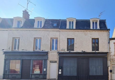 Immeuble de rapport: 2 locaux commerciaux, 4 logements