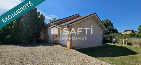 Maison de plain pied avec garage 912 m² de terrain