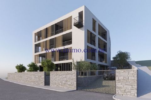Apartments for sale, under construction in a building with an elevator located in an exceptional location in the first row to the sea. The building will have four floors. The ground floor consists of a parking lot with storage, and the upper three fl...