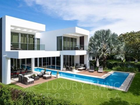 CASA DEL SOL  Luxurious house with elegant contemporary architecture for sale in the exclusive Valle del Sol residential complex in Santa Ana, Costa Rica. This bright home has a privileged location in a tropical environment with wonderful panoramic v...