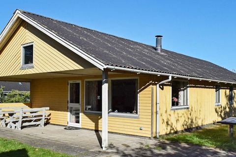 A great holiday home with a sauna, located in scenic area approx. 800 metres from Nissum Fjord, where you can go swimming and surfing. The kitchen is functionally connected to the living room, and from here you can access the terrace. There is a swin...