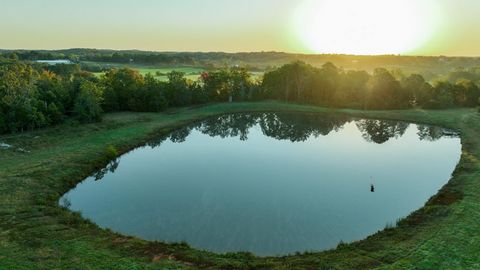 Lake Valley Farm is located right on the edge of town just outside Willow Springs, Missouri. Multiple ponds with live water, fenced and crossed fenced, paved road access, and an operating hay and cattle ranch make just some of the features of this ou...