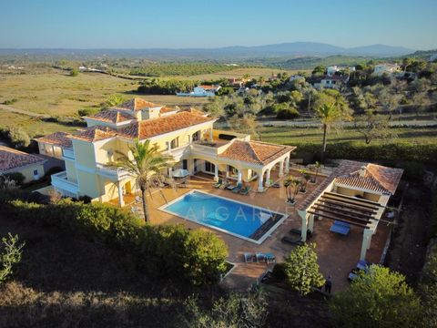 This fairytale villa is located in a tranquil setting between Luz & Lagos, with stunning country views towards Monchique. The living accommodation is split over 3 floors; on the entrance floor you are welcomed by a large, airy hallway with stunning v...