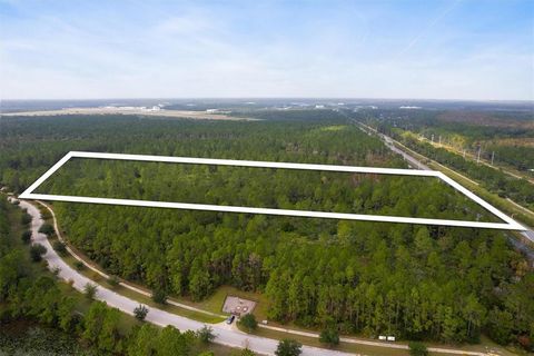 Exceptional offering in Palm Coast - Approximately 27.2 acres of prime commercial/industrial land consisting of two contiguous parcels within the highly sought-after Industrial 1/ Mixed Use zoning district. Zoning accommodates a wide range of industr...