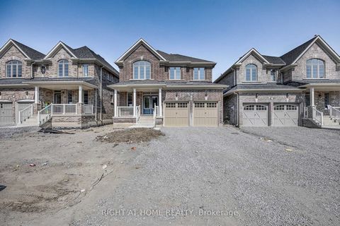 Nestled near Killarney Beach and the marina, just a 15 min walk to the beach, this beautiful 4-bedroom home in Lefroy, Innisfil, offers a blend of modern elegance and natural charm. The open-concept living spaces are bathed in sunlight, highlighting ...