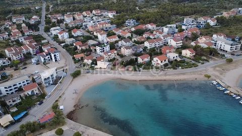 Srima – residential building with 5 apartments, only 50 m from the sea! Beautiful house with five apartments, total area approx. 400 m², on a plot of 489 m², built in 2021. The house consists of a ground floor and two upper floors. On the top, there ...
