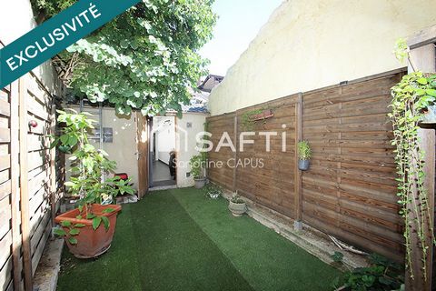 MAISON DE VILLAGE AVEC GARAGE ET JARDIN