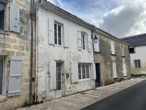 Ancienne boutique devenue pied-à-terre