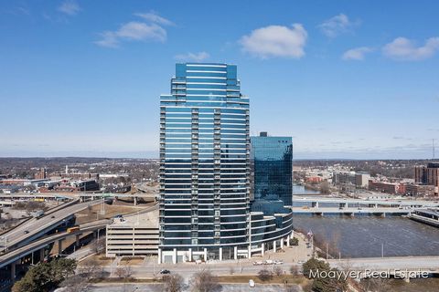 Elevate your lifestyle in this seductive Grand Rapids penthouse at the River House, where breathtaking views meet unparalleled luxury. Spread across 4,800 square feet, this 32nd floor suite is the unique result of merging two large east-facing corner...
