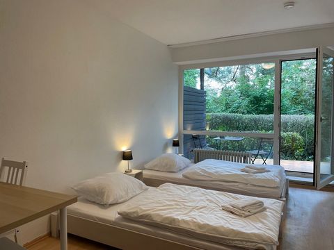 Nice apartement in Höchberg with an own terrace, where you can see the green garden.