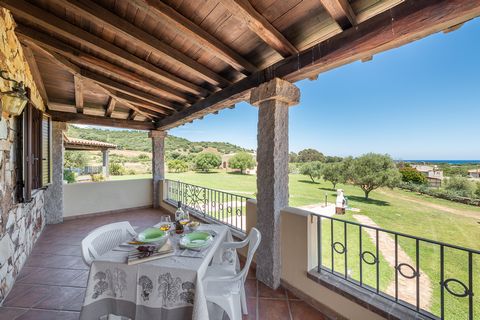 HOLIDAY HOUSE immersed in the green of the Mediterranean vegetation, convenient to the beaches of La Caletta, Santa Lucia, Sa Pedra Ruia. Inserted in a small and very recent residential complex, it consists of a living room with kitchenette and sofa ...
