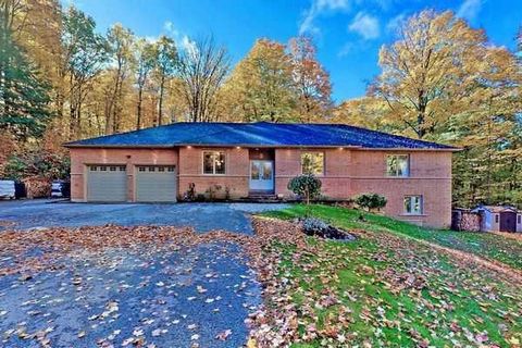 Welcome to 5149 Davis Drive, Only Asking for $1,800,000 This Stunning home is situated on 5 ACRES partially cleared wooded lot with a picturesque land, private trail just north of Vivian Forest. Winding driveway leads you to the front door. Tall tree...