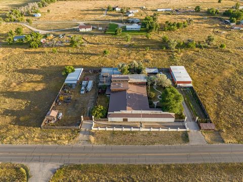 Nestled within the cultural heart of Fort Washakie, Wyoming, the historic R.V. Greeves property offers a truly unique blend of history, art, and income opportunities. This remarkable and unique estate, situated on a fully fenced 1-acre lot, boasts a ...