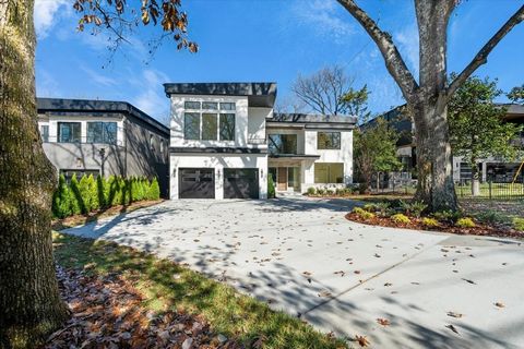 Stunning New Build from Ascent Construction in an amazing location on a 75' wide and 340' deep lot 10' ceilings on both levels, hardwoods and tile floors throughout and outdoor living space off the back of this home that truly lets you take advantage...