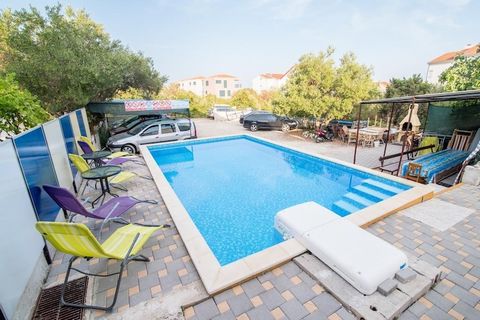 Apartments Fidelis feature set of accommodation units located in the island of Čiovo, Split region. Private parking available, reservation is not required. Baby cot available upon request. Pets allowed upon request, fees apply (12 EUR per night) Shar...