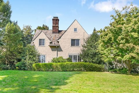 Nestled in the heart of Scarsdale's historic Cotswold district on a half of acre of land, this charming Tudor-style home offers a perfect blend of modern comfort and timeless elegance. Just a stone's throw from desirable Scarsdale village and Metro N...