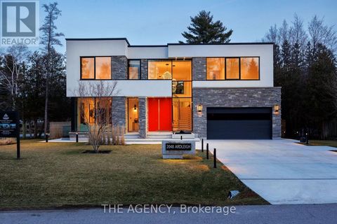 Nestled at the serene end of a peaceful cul-de-sac, this magnificent 5-bedroom, 7-bathroom residence spans over 6,000 square feet, reflecting an impeccable blend of exquisite craftsmanship and modern elegance. The collaboration between the esteemed Z...