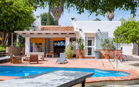 Located in Nueva Andalucía. ANDALUSIAN STYLE RESIDENCE Step into the luxurious lifestyle you deserve with this exquisite Andalusian-style residence nestled in the heart of Nueva Andalucía. Tucked away in a tranquil neighborhood yet conveniently acces...