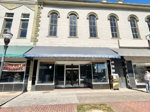 This charming retail space is located in the heart of a quaint downtown area, offering prime visibility and foot traffic for any business. The property features two levels of spacious display areas, perfect for showcasing products and attracting cust...